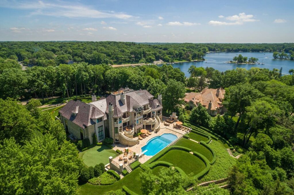 Aerial view of Lake Minnetonka with luxury homes along the shore. Aerial view of Lake Minnetonka with luxury homes along the shore.